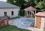 create a custom backyard design with pool and patio